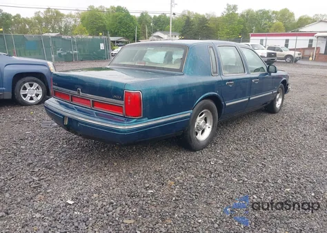 1997 Lincoln Town Car Signature из США, поврежденный, VIN 1LNLM82W6VY647279